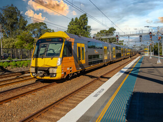 Fototapeta premium Passenger Train going through Summer Hill train station a suburban Sydney train Station NSW Australia