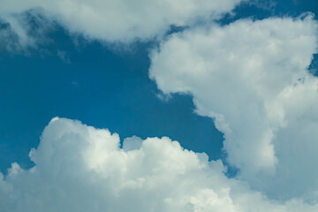 White clouds contrasting with a deep blue sky