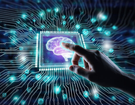 A finger touches a brain hologram on a computer chip with glowing blue circuit board lines around it - Powered by Adobe