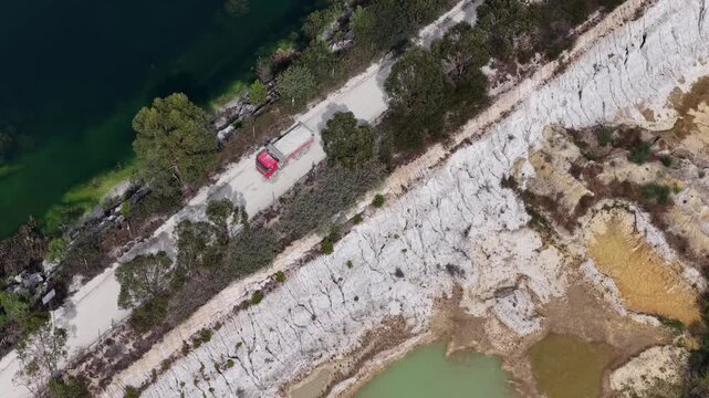 Truck on a road in a quarry diagonal framing