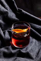 Red Negroni with black background. 