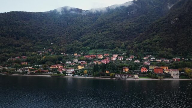 Village and mountain landscape along the shores of Lake Como. Onno city on Lake Como, Lombardy, Italy