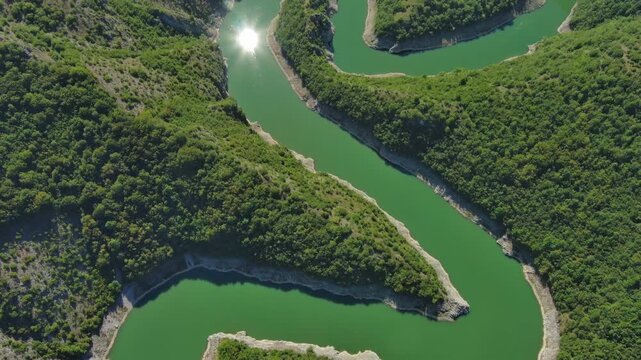 Aerial top view of curved meanders in canyon of Uvac river, Serbia, 4k