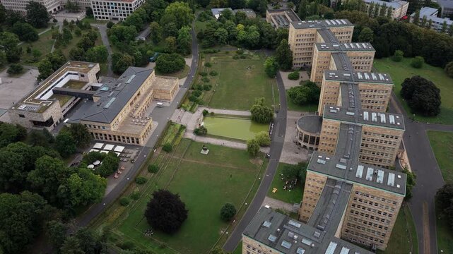 Aerial view of Goethe University Frankfurt, showing Poelzig Building and IG Farben Haus on Westend Campus with green areas