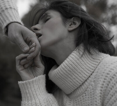 This is a close-up portrait of a man and a woman about to kiss. Couple in love. Sensual. Man and woman. Romance. Lovers. - Powered by Adobe