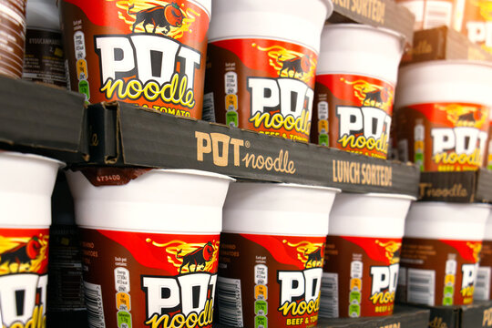 London,UK-September,27 2025: Pot Noodle Beef and Tomato stock on store shelves. A Unilever food brand, the instant noodle convenience snack product is popular in the UK. Available in many flavours.