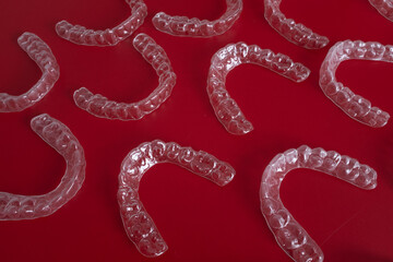 Invisible orthodontic aligner. Transparent dental aligners or braces aplicable for an orthodontic dental treatment. Orthodontic technology and oral health