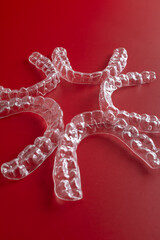 Invisible orthodontic aligner. Transparent dental aligners or braces aplicable for an orthodontic dental treatment. Orthodontic technology and oral health