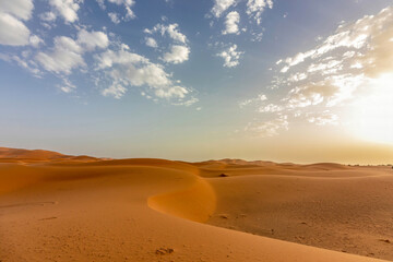 Sunset over golden sand dunes in the Erg Chebbi desert near Merzouga in southeastern Morocco