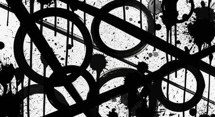 Abstract black and white ink splatters creating dynamic and chaotic composition