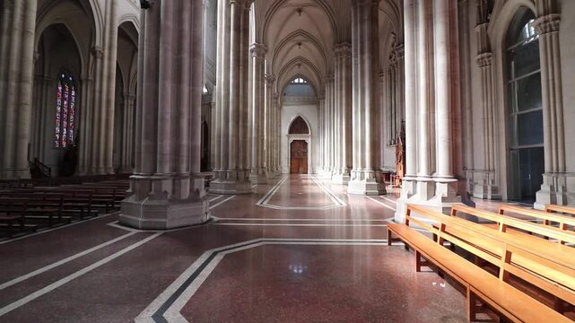 Majestic interior of the La Plata Cathedral. The atmosphere evokes faith, devotion, and religious pilgrimage within the Gothic Revival sanctuary.