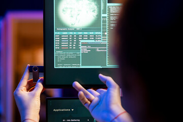 Close up of hacker using USB stick to extract government secrets information from secure digital...