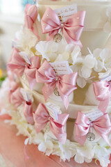 flower, gift, celebration, communion, party favor, sugared-almond, party, sweet, bow, almond, wedding, comfit, confection, sugar, background, ribbon, baptism, religion, colours, event, decoration, chi