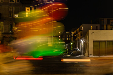 Colorful abstract light trails on city street