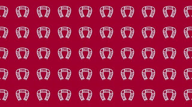 Repeating horseshoe pattern on red background. Suitable for westernthemed designs, equestrian events, or luckinspired concepts. Great for fabric, wallpapers, or posters.