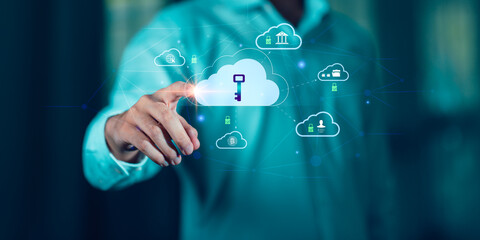 A businessman touching a virtual cloud with a key icon, symbolizing cybersecurity, cloud data protection, privacy encryption, and secure network access in modern digital technology systems.