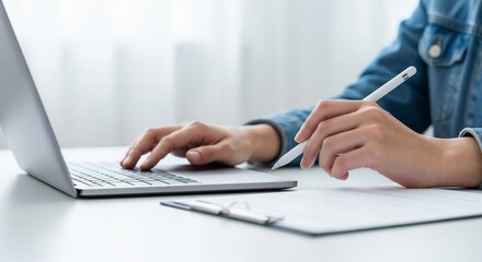 close up of female hands typing on keyboard