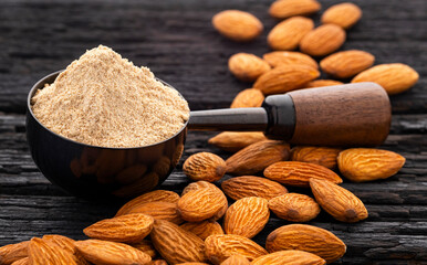 Prunus dulcis - Ground dried almonds in a spoon