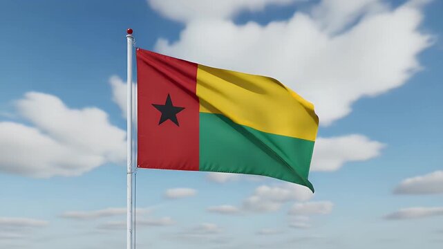Guinea Bissau flag proudly waves in the clear blue sky, symbolizing national pride and freedom during a dynamic, sunny day.
