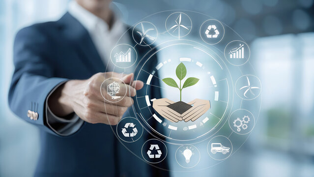 Business professional pointing to holographic plant in protective hands surrounded by renewable energy icons in futuristic office for sustainability innovation.