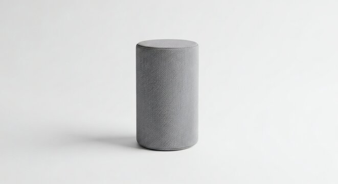 Cylindrical fabric-covered bluetooth speaker mockup on white background.