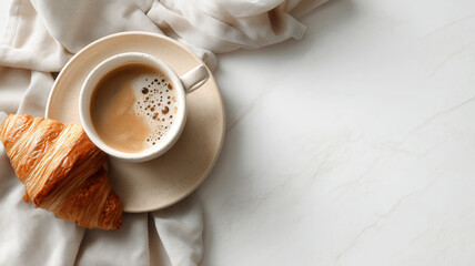 Morning coffee and croissant on marble background
