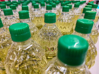 Bottles of olive oil in the process of being packaged for export and sale