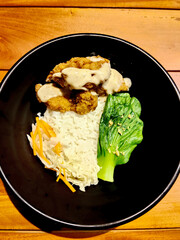 Crispy Fried Chicken Katsu Rice Bowl Topped with Creamy White Mushroom Sauce