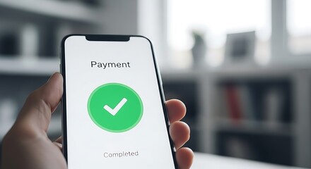 A person holding a smartphone displaying a successful payment confirmation with a green checkmark on the screen background image
