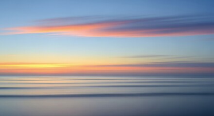 Tranquil ocean horizon at dusk with blurred pastel clouds and smooth waves, evoking a sense of peace and quietude