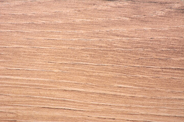 Dark oak striped natural wood pattern close-up.