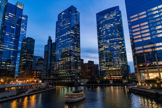 Business city. Night cityscape of Chicago skyscraper building. Chicago architecture of skyscraper. City night illuminated building. Skyscraper cityscape. Night city of Chicago. Nighttime city
