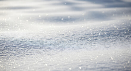 Obraz premium Shimmering texture of pristine white snow illuminated by crisp winter sunlight