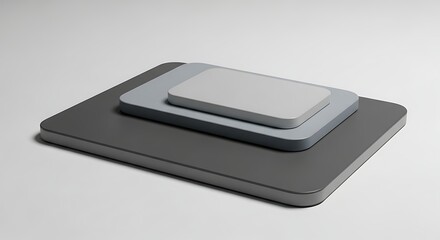 Stack of Gray Cutting Boards on White Background.