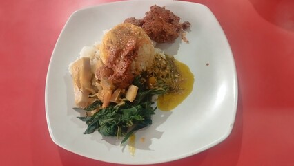 Nasi Rendang Served in the plate