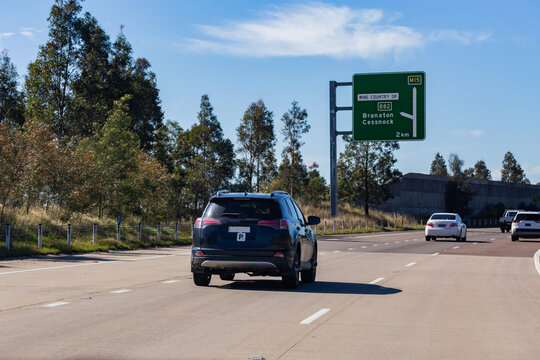 Car with green p plate driving on highway leaving Singleton towards wine country drive