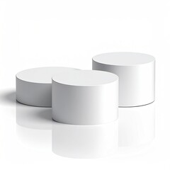 3 white cylindrical pedestals, staggered heights, white ground