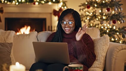 Young Woman Enjoying a Festive Christmas Video Call at Home. - Powered by Adobe