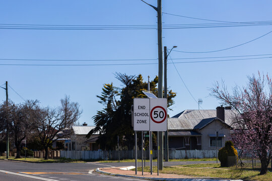 end school zone 50 speed sign in town