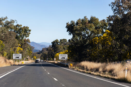 Emergency arrester bed on left sign for trucks on highway road