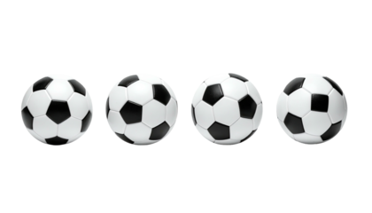 Four classic black and white soccer balls in a neat row