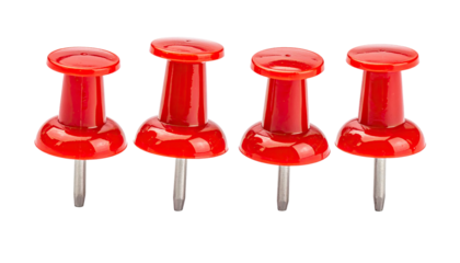 Four red pushpins stand in a line against a dark background