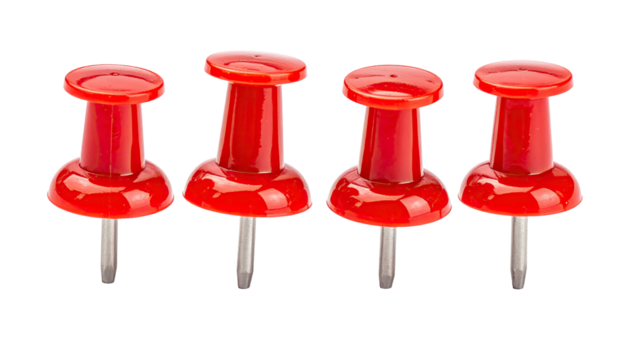 Four red pushpins stand in a line against a dark background