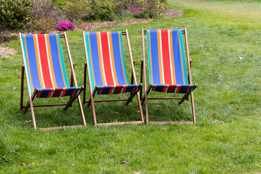 Striped brightly coloured outdoor deck chairs