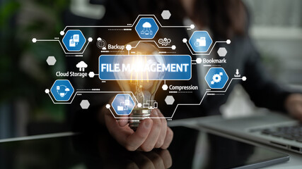 A modern workspace featuring a lightbulb symbolizing innovative concepts in file management, cloud storage, and data backup. Perfect for technology-related projects. Tessel