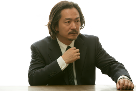 Man in suit adjusting tie isolated on transparent background