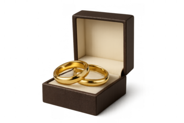Gold wedding rings resting in an open jewelry box illustrating commitment, marriage, and engagement for a lasting relationship