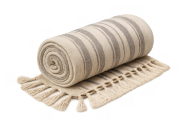 Rolled striped blanket with tassels, cozy beige and gray textile throw for home decor during winter