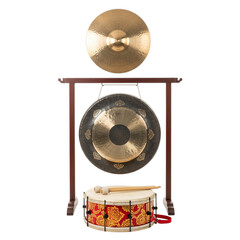 Traditional asian musical instruments including a gong and a drum on a wooden stand isolated on transparent background