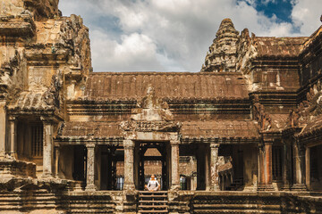 Feeling spirituality at Angkor Wat temple in Cambodia.